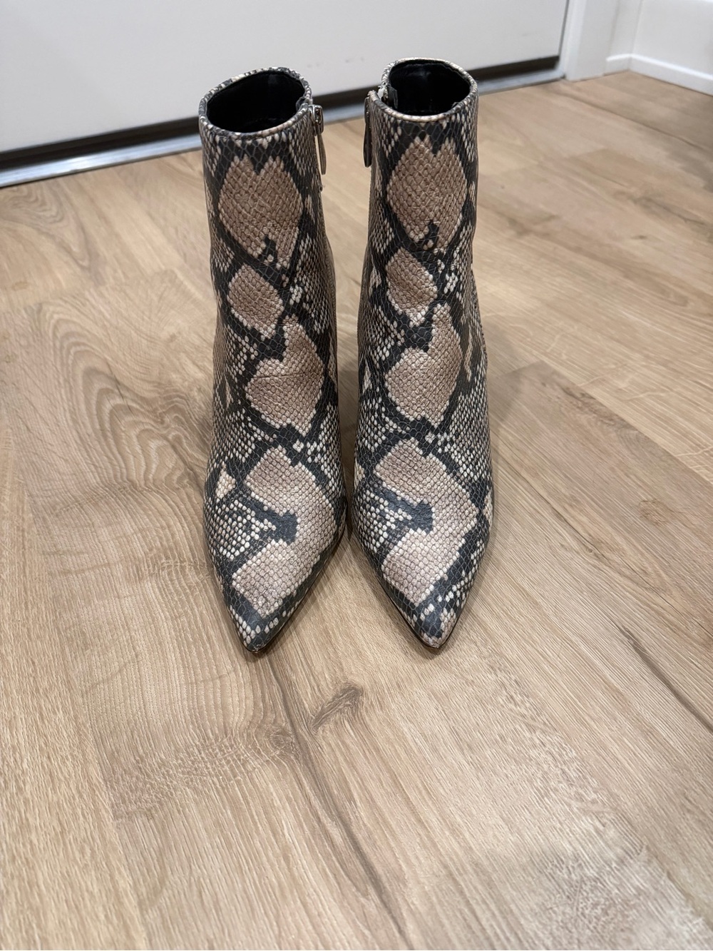 Steven By Steve Madden Snake-Print Pointed Toe Ankle Boots in Beige and Black